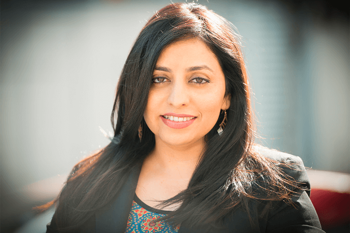 Image of Ana Tiwary standing outdoors in day light looking at the camera