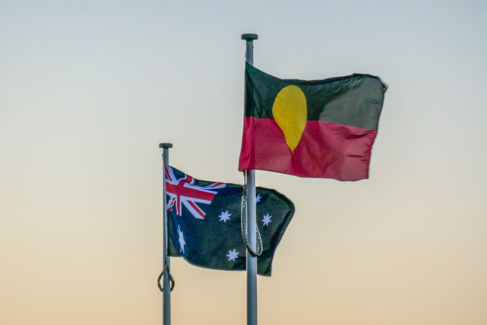 The Australian and Australian Aboriginal flags fly at Bondi Icebergs Club, Bondi Beach, Sydney.